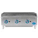 A Globe gas charbroiler with cast iron radiants on a counter.