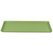 A lime green rectangular tray with a white border.