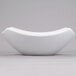 An American Metalcraft white stoneware bowl with a square shape on a gray surface.