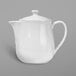 A close-up of a Libbey Ultra Bright White Porcelain Teapot with Lid.