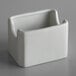 A Libbey Ultra Bright White porcelain sugar packet holder.