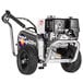 A Simpson aluminum water blaster pressure washer with a Honda engine and hose on wheels.