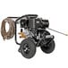A Simpson pressure washer with a hose attached.