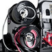 A black and white Simpson pressure washer with a hose.