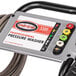 A Simpson Powershot pressure washer with a hose.