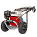 A close-up of a Simpson gas powered pressure washer with a Honda engine and 25' hose.