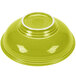 A lemongrass Fiesta pedestal serving bowl with a white rim.