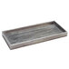 A rectangular brushed metal amenity tray with a hand-painted finish.