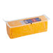 A rectangular yellow block of Great Lakes yellow sharp cheddar cheese with a blue label.