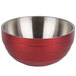 A red and silver stainless steel Vollrath beehive serving bowl.