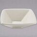 A white square Tuxton china bowl.