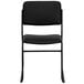 a black folding chair with a black cushion