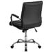 a black office chair with chrome legs