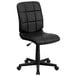 A Flash Furniture black quilted vinyl mid-back office chair with wheels.