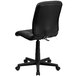 A Flash Furniture black vinyl mid-back office chair with wheels.