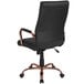 A Flash Furniture black leather office chair with rose gold legs.