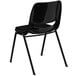 A black Flash Furniture stack chair with legs.