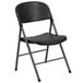 A Flash Furniture black plastic folding chair with charcoal metal legs.