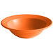 An orange bowl with a white background.