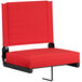 A red seat with black frame on a Flash Furniture Grandstand comfort seat.