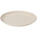 A white GET Manila melamine side dish plate with a small rim.