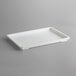 a white rectangular object on a gray background