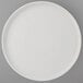 A Tuxton Zion matte white china plate with a white rim.