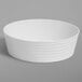 An American Metalcraft Del Mar white plastic serving bowl with wavy lines.
