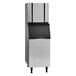 A silver rectangular Ice-O-Matic air cooled ice maker with a black and silver label.
