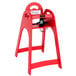 A red Koala Kare child's high chair.