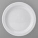 A close-up of a Tuxton Pacifica bright white narrow rim embossed china plate.