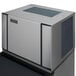 An Ice-O-Matic air cooled full dice cube ice machine with a stainless steel rectangular top.