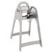 A grey Koala Kare high chair with a tray and seat strap.