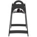 a black high chair with a strap