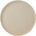 A Tuxton TuxTrendz Zion Matte Beige china plate with a round rim.