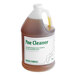 A case of 4 Advantage Chemicals gallon bottles of concentrated pine cleaner on a counter.