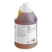 A large plastic jug of yellow Advantage Chemicals Concentrated Pine Cleaner with a white label.