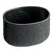 An American Metalcraft black oval bowl with a textured surface.
