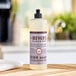 A bottle of Mrs. Meyer's lavender scented dish soap on a counter.