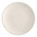 An Acopa ivory stoneware plate with a plain edge on a white background.