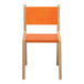 A Whitney Brothers children's chair with wooden legs and an orange seat and back.