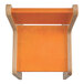 A Whitney Brothers orange wooden children's chair.