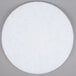A white circular Scrubble 41-20 floor pad.