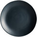 A close-up of a black Carlisle melamine dinner plate with a rim.