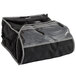 A black Vollrath insulated pizza delivery bag with a grey trim and clear plastic inside.