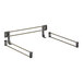 A pair of black metal bars with gold handles.