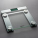 a glass scale with a green screen