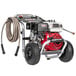 A Simpson gas powered pressure washer with a Honda engine and hose.
