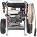 A Simpson gas powered pressure washer with a hose attached.