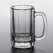 A clear glass Anchor Hocking beer mug with a handle.